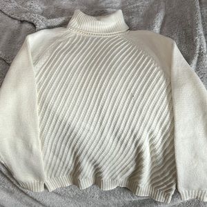Perfect for winter time white turtle neck sweater